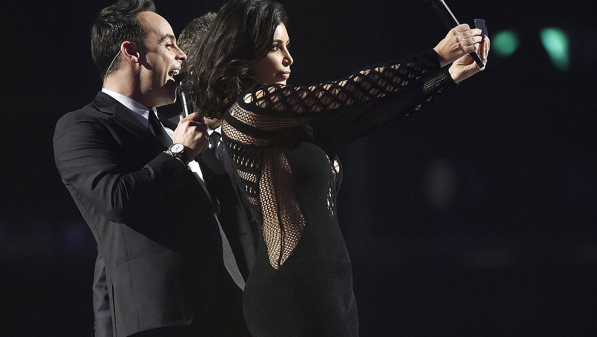 

<!--StartFragment-->Kim Kardashian poses for a selfie with presenters Ant and Dec at the BRIT music awards at the O2 Arena in Greenwich, London. (Photo : Reuters)<!--EndFragment-->