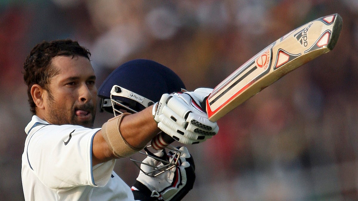 Sachin Tendulkar acknowledges a century in this file photo from his playing days. (Photo: Reuters)