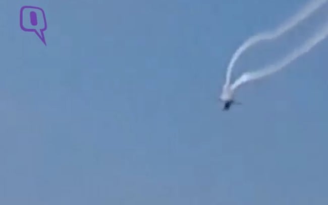 Aerobatic planes collided in the sky, killing one pilot.&nbsp;(Photo: AP screengrab)