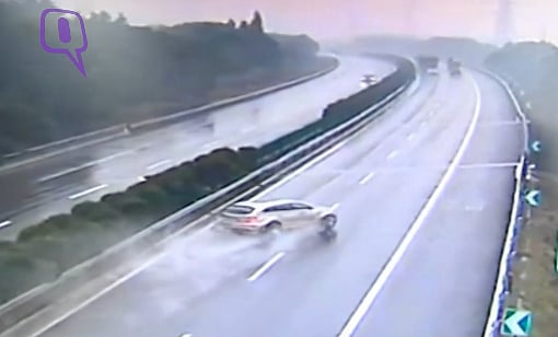 Car spins on a wet highway in China. (Photo: AP screengrab)