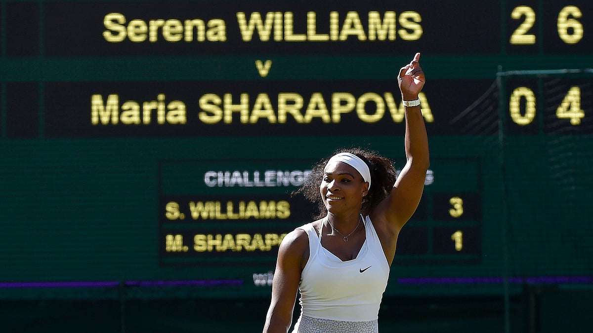Serena Williams waves to the crowd after winning her semifinal against Maria Sharapova. (Photo: Reuters)