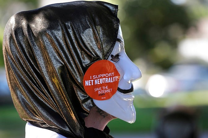 An activist during a protest or Net Neutrality in India. (Photo: Reuters)