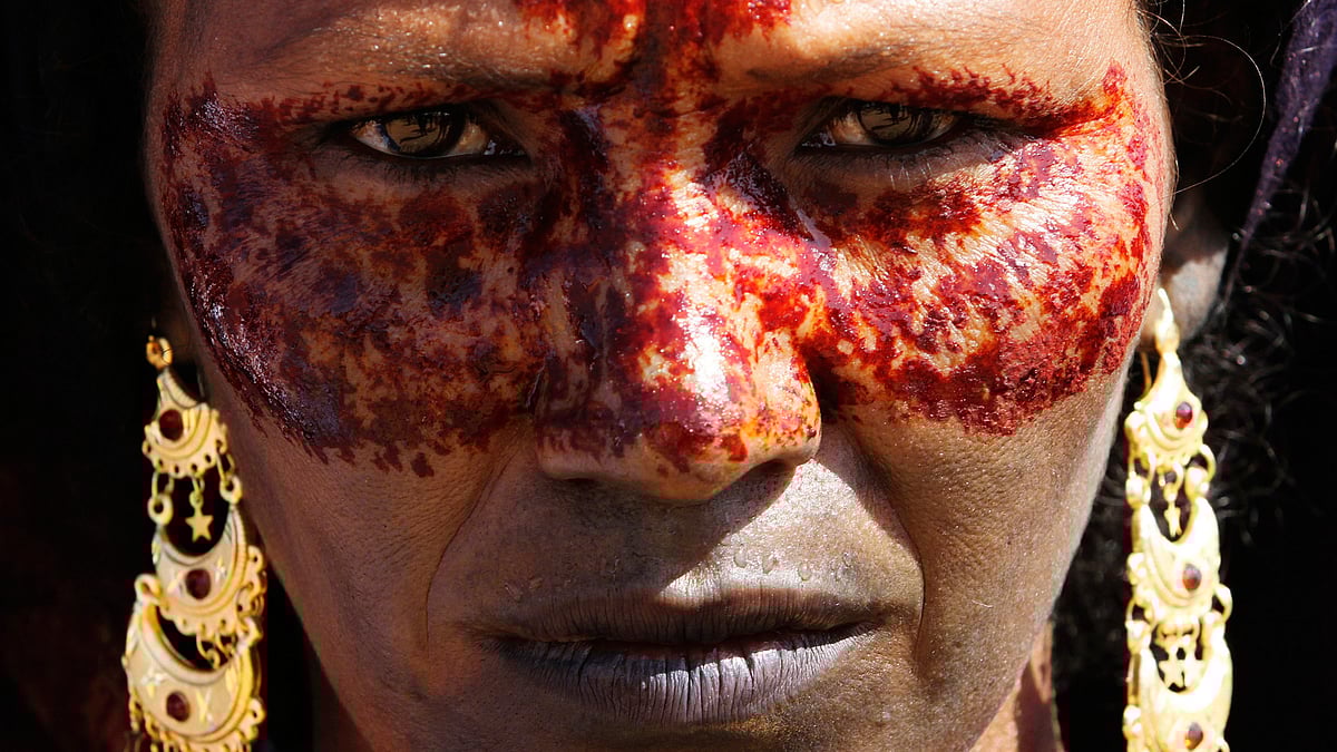 A Tuareg woman with a&nbsp;painted face. (Photo: Reuters)&nbsp;