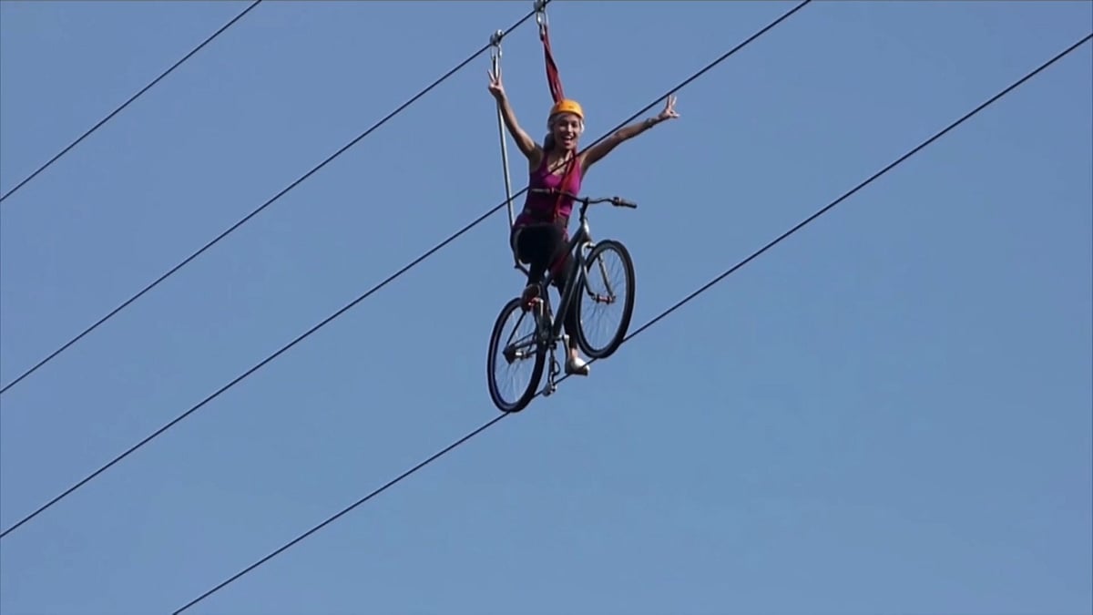 A tourist tries out&nbsp;gravity defying sky cycling in Philippines. (Photo: AP)
