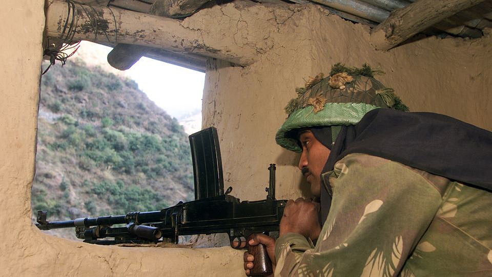 Indian army soldier in a bunker at Odussa, close to Srinagar, Kashmir. (Photo: Reuters)