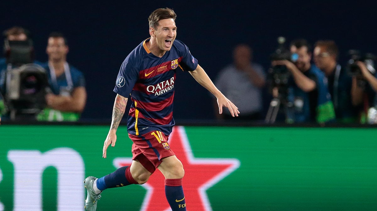 Messi celebrates after scoring his second goal at the UEFA Super Cup. (Photo: AP)
