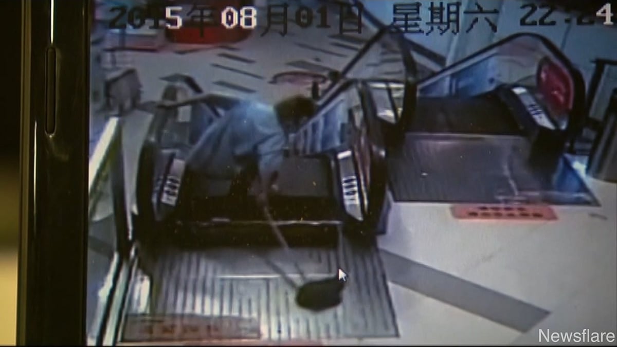 Zhang Shisheng, who got suck in an escalator in a mall in Shanghai,&nbsp;China. (Photo: AP Screengrab)
