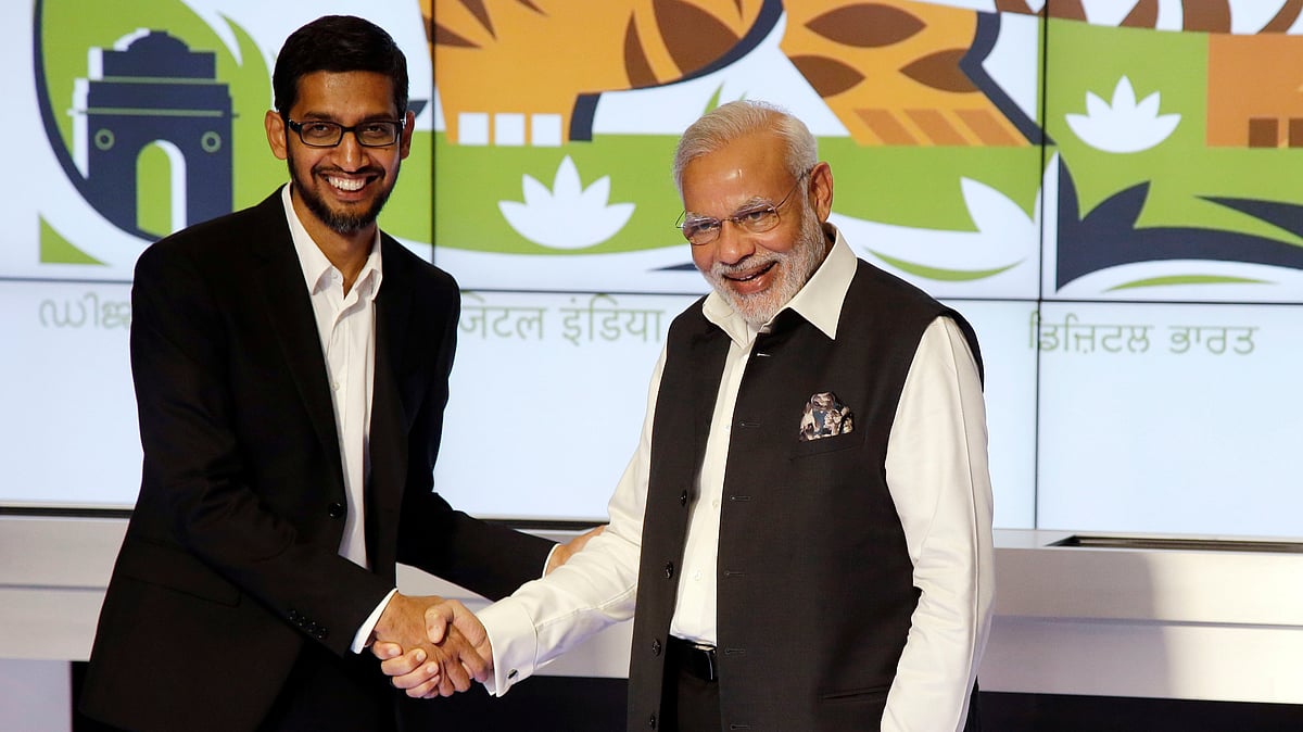 Prime Minister Narendra Modi, right, shakes hands with Google CEO Sundar Pichai at the company’s headquarters, in Mountain View , Calif.&nbsp; (Photo: AP)