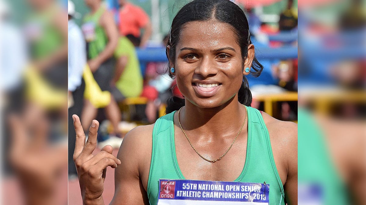 Dutee Chand celebrates after winning the Women’s 100m race&nbsp;during 55th National Open Athletic Championship. (Photo: PTI)