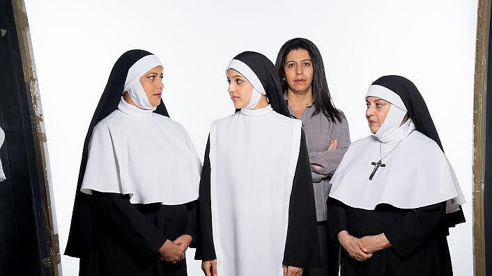 Anahita Uberoi (in grey) plays Dr Martha Livingston, a psychiatrist, in Kaizaad Kotwal’s theatre production <i>Agnes f God</i> (Promotional still)