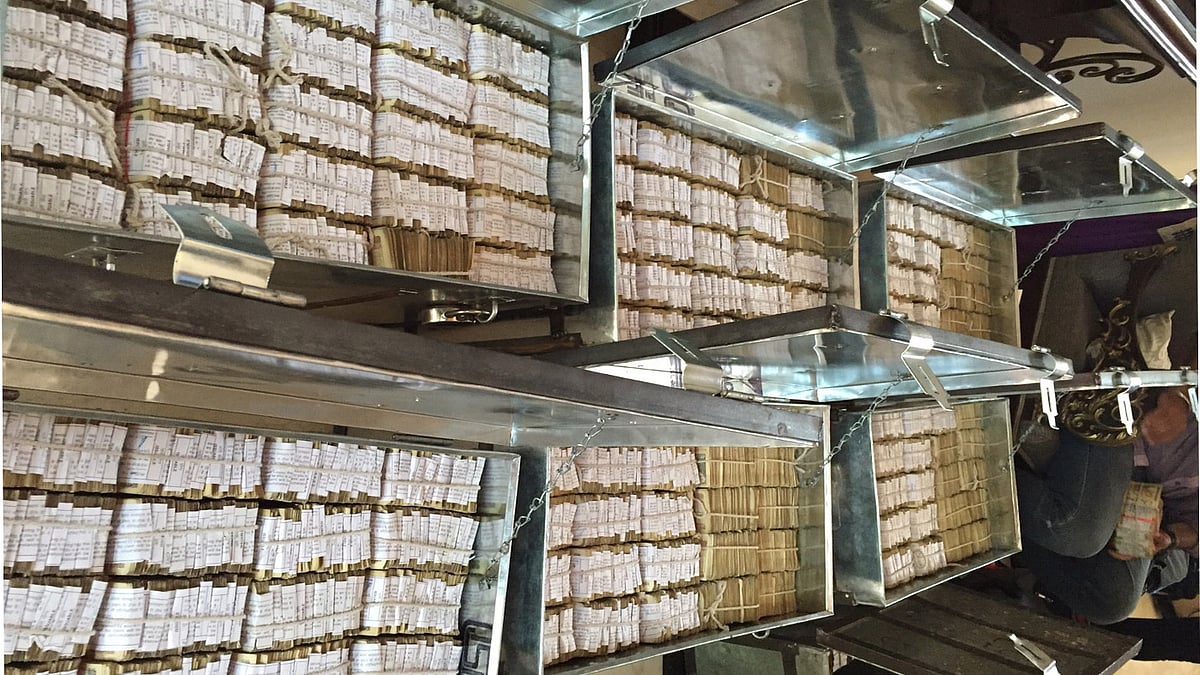 Bundles of cash confiscated by the CBI is stored in trunks before being counted. (Photo Courtesy: CBI HQ)