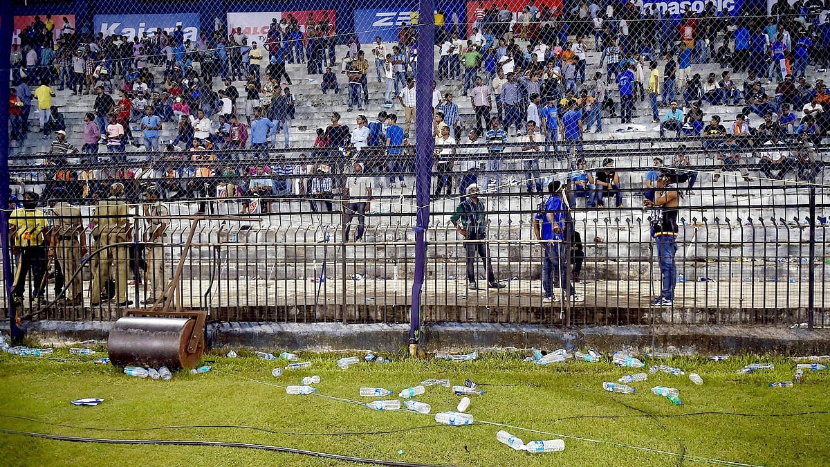 Water bottles thrown by spectators lie on the ground during the second Twenty20  in Cuttack. (Photo: AP)