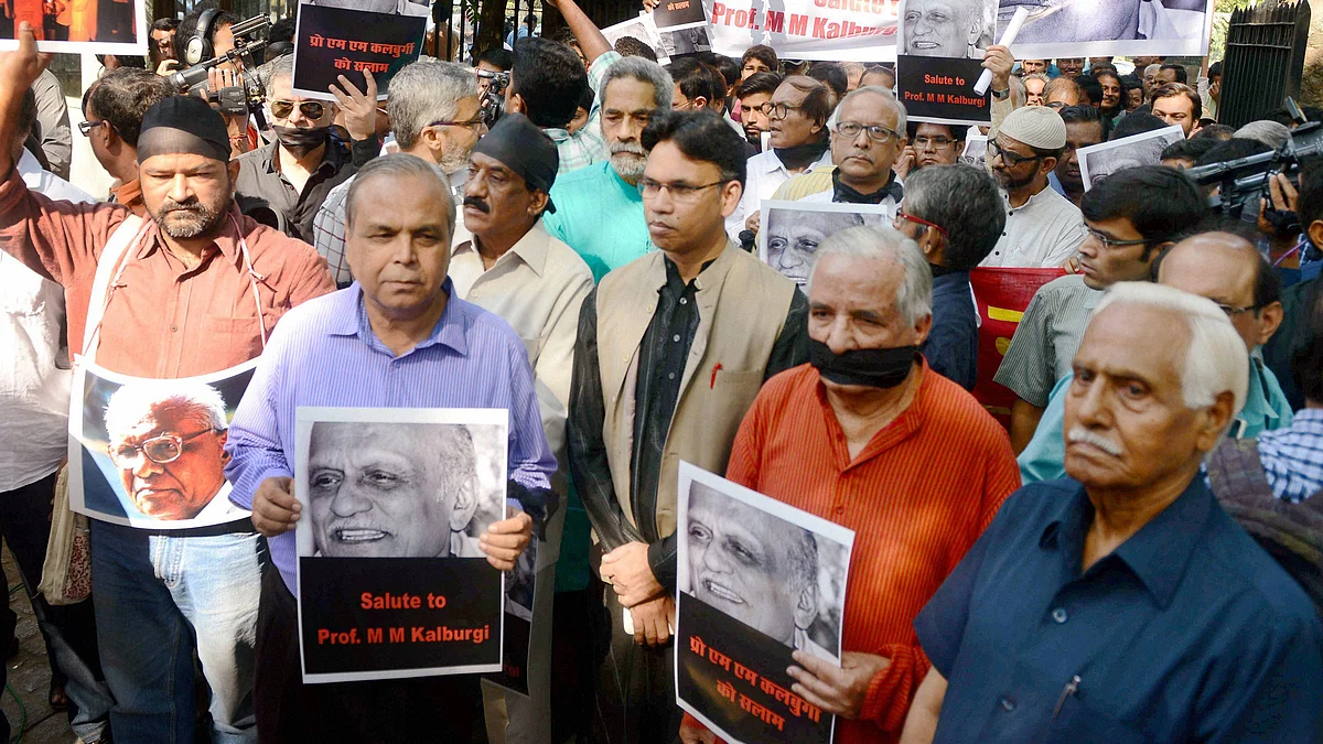 File photo of writers and cultural activists with black bands take out a solidarity march. (Photo: PTI)