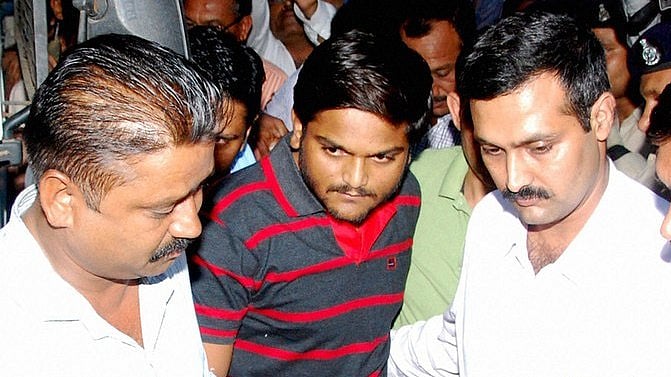 Patidar Samiti leader Hardik Patel (centre) produced in a court in Surat. (Photo: PTI)