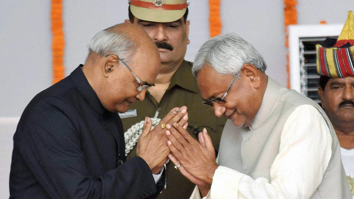 Nitish Kumar greets Governor Ram Nath Kovind after taking oath as the Chief Minister of Bihar during the swearing-in ceremony at Gandhi Maidan in Patna on Friday. (Photo: PTI)&nbsp;