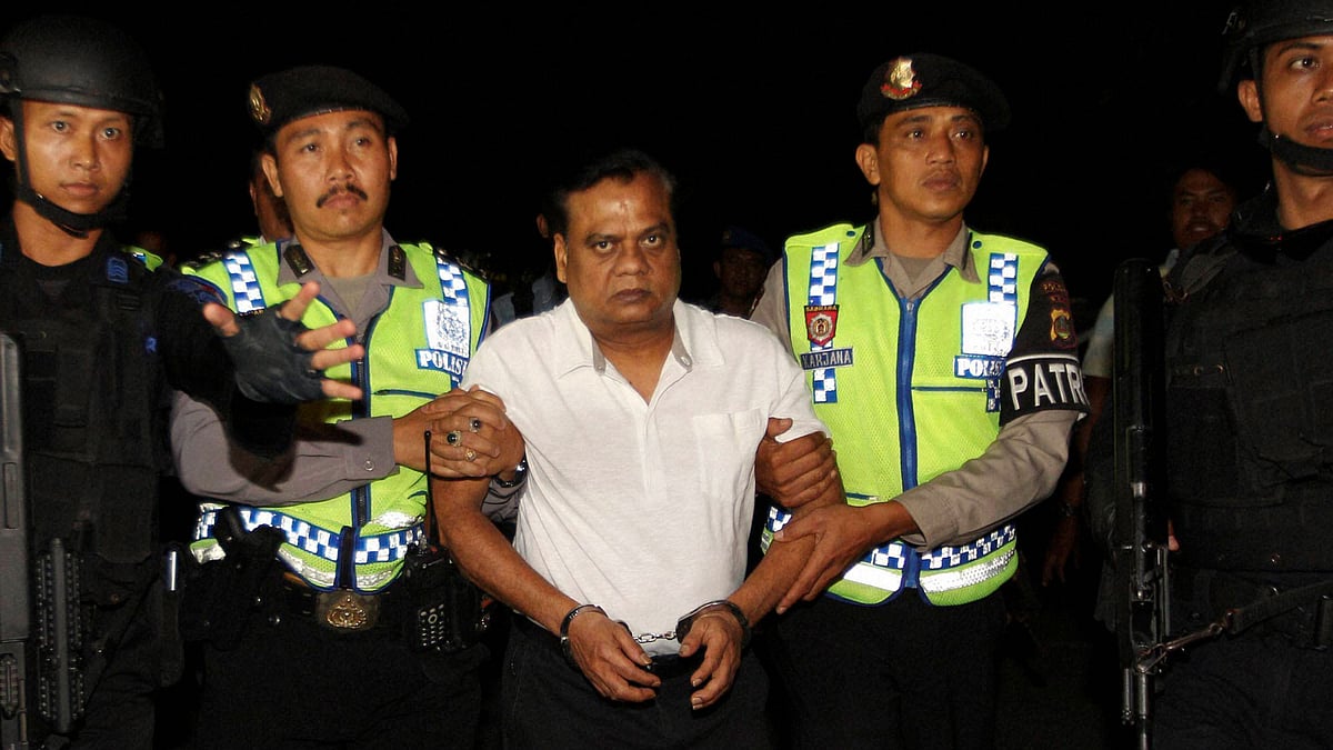 Chhota Rajan escorted by Bali police before being deported to India. (Photo: PTI)