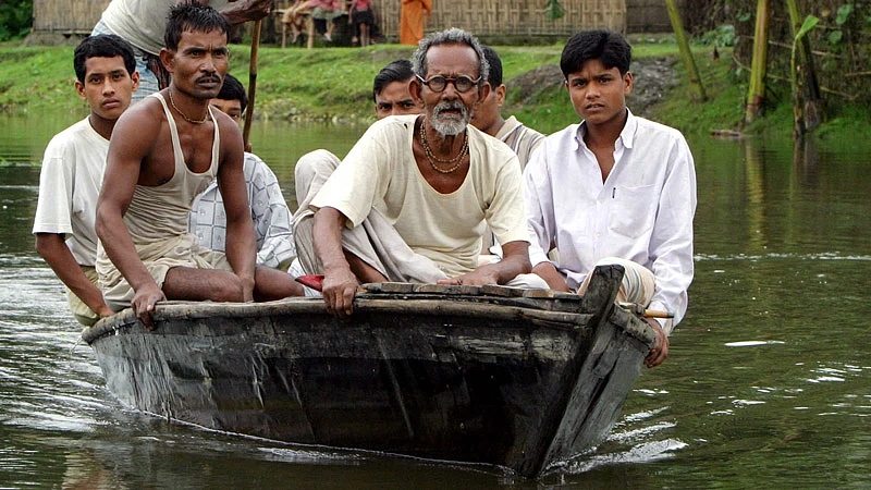 Residents return to their homes at Dasiarchhara Indian enclave from Bangladesh territory. (File Picture: Reuters)
