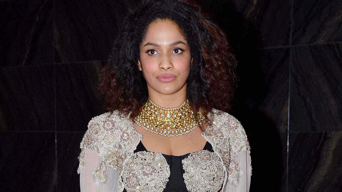 Masaba is as shocked with the choice of embellishments on her wedding reception outfit as we are (Photo: Yogen Shah)