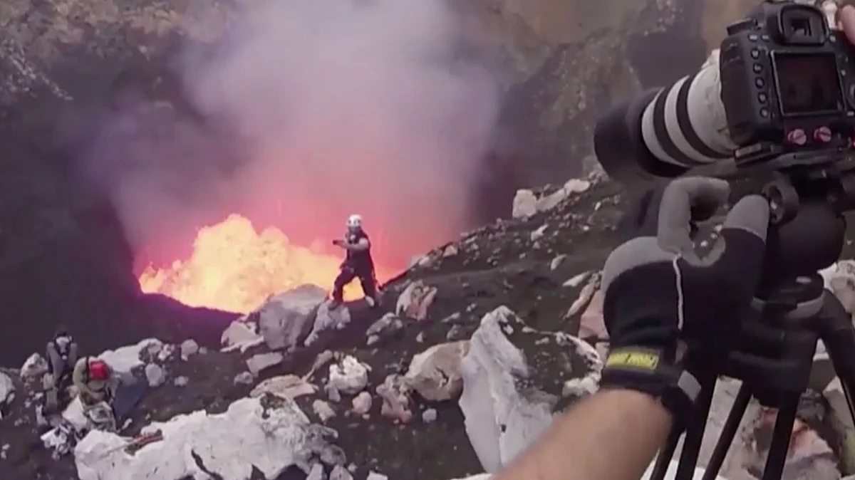 Adventurer Nik Halik inside the Benbow volcanic crater in Vanuatu. (Photo: AP/Caters TV screengrab)