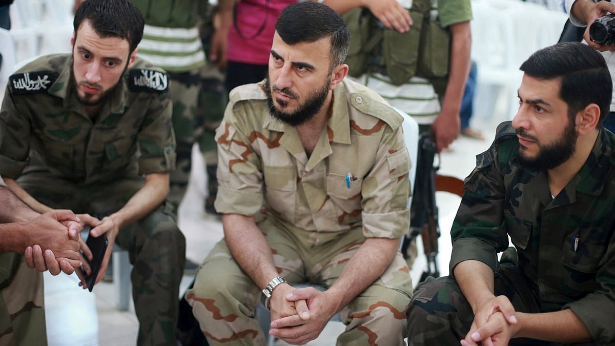 A file photo of Zahran Alloush (middle) commander of Jaysh al Islam. (Photo: Reuters)
