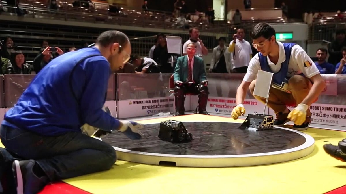 Participants with their robots at the International Robot Sumo Tournament 2015 in Tokyo, Japan. (Photo: AP/Aflo screengrab)