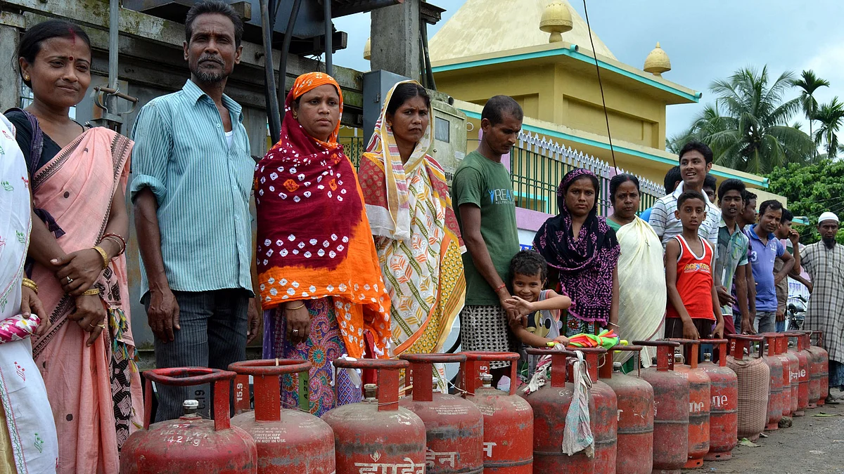 People queue-up to refill their LPG cylinder in Nagaon district of Assam. (Photo: IANS)&nbsp;