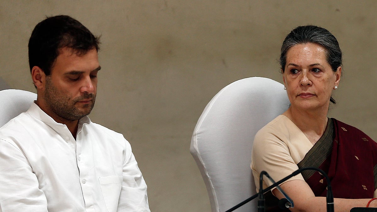 Congress President Sonia Gandhi (right) and Vice President Rahul Gandhi (left) will be appearing in the trial court on 19 December in the National Herald case. (Photo: Reuters)