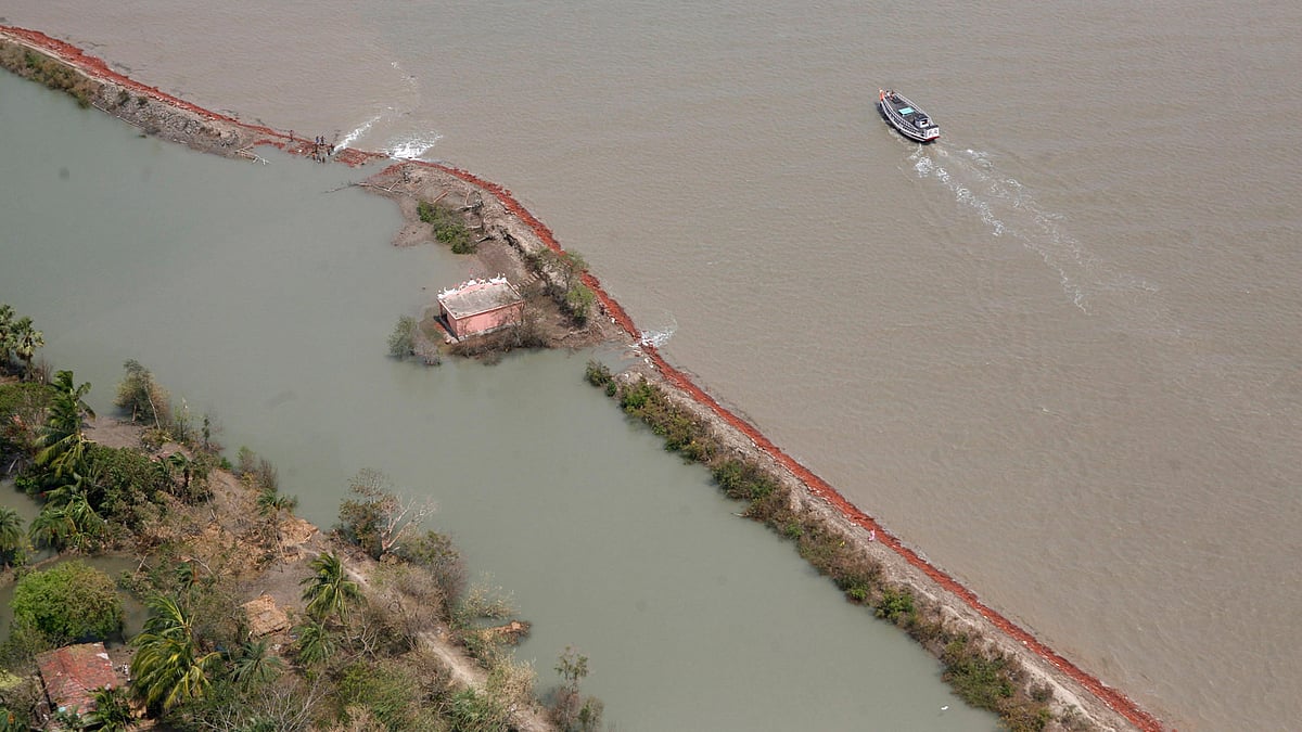 <div class="paragraphs"><p>A flooded embankment along the Ganges River in the Sundarbans delta.  </p></div>
