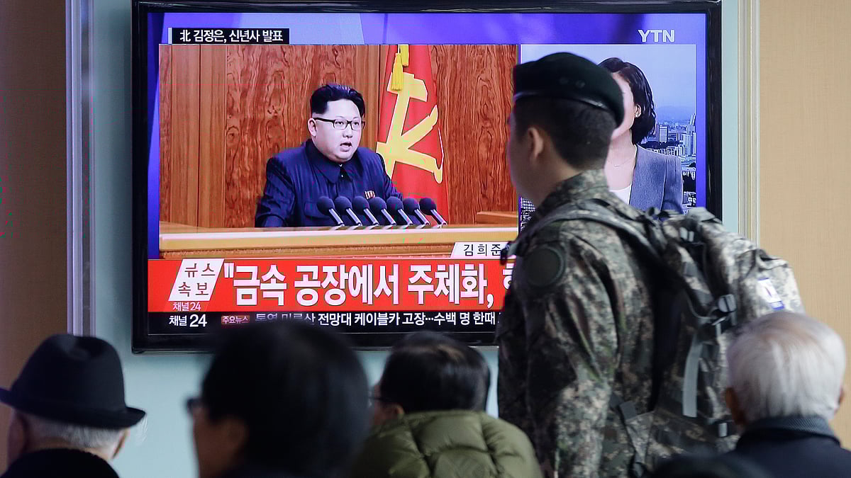 A South Korean army soldier passes by a TV news program showing North Korean leader Kim Jong Un’s New Year speech, at the Seoul Railway Station in Seoul, South Korea.&nbsp;(Photo: AP)