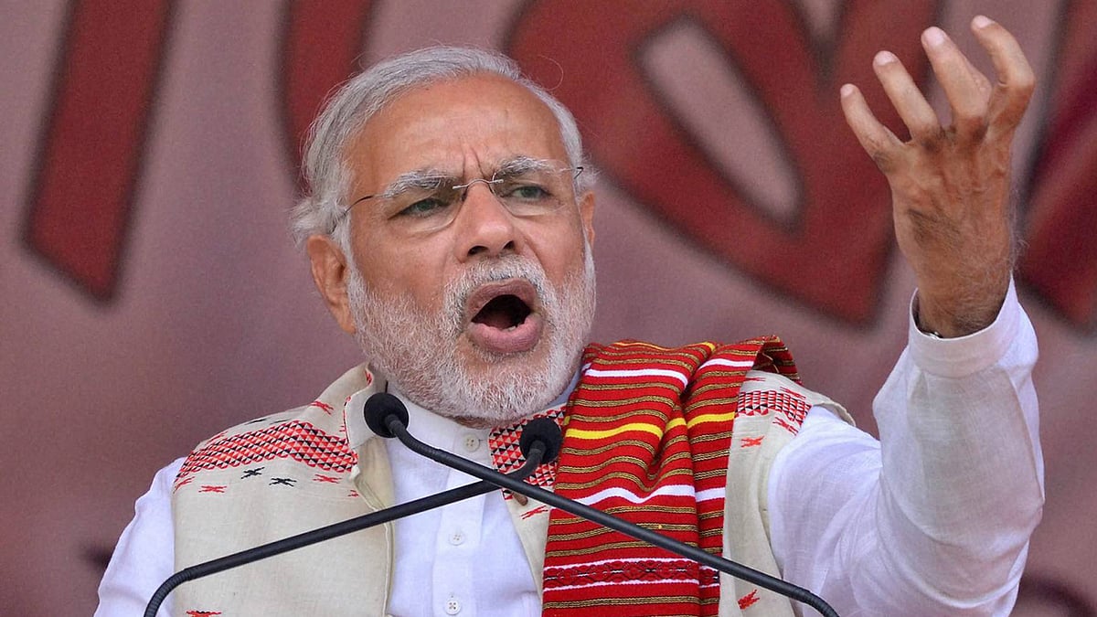 Prime Minister Narendra Modi addressing the BJP Youth Rally at Veterinary Playground, Khanapara in Guwahati on Tuesday. (Photo: PTI)