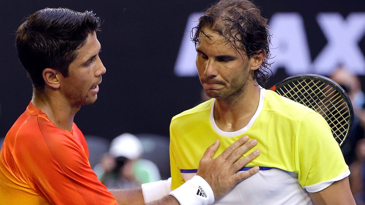 Rafael Nadal is consoled by compatriot Fernando Verdasco after his first round loss at the Australian Open. (Photo: AP)<a></a>