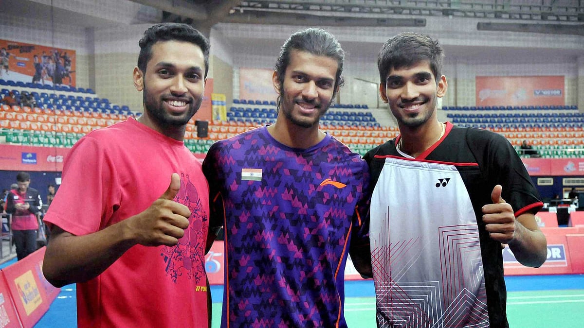 HS Prannoy, Ajay Jayaram and Srikanth K after defeating their Chinese opponents in the men’s singles events of Badminton Asia Team Championships. (Photo: PTI)