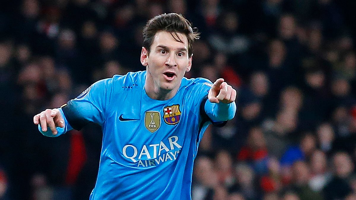 Lionel Messi celebrates after scoring a goal against Arsenal. (Photo: AP)