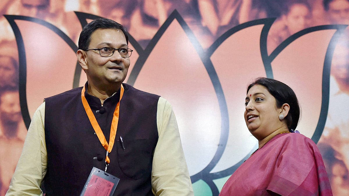 Smriti Irani announces freedom fighter Subhas Chandra Boses grand-nephew, Chandra Kumar Bose’s candidature for WB assembly elections on Wednesday. (Photo: PTI)