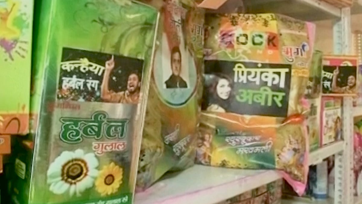 Holi colours and <i>pichkaris</i> named after political leaders and celebrities. (Photo: ANI Screengrab)