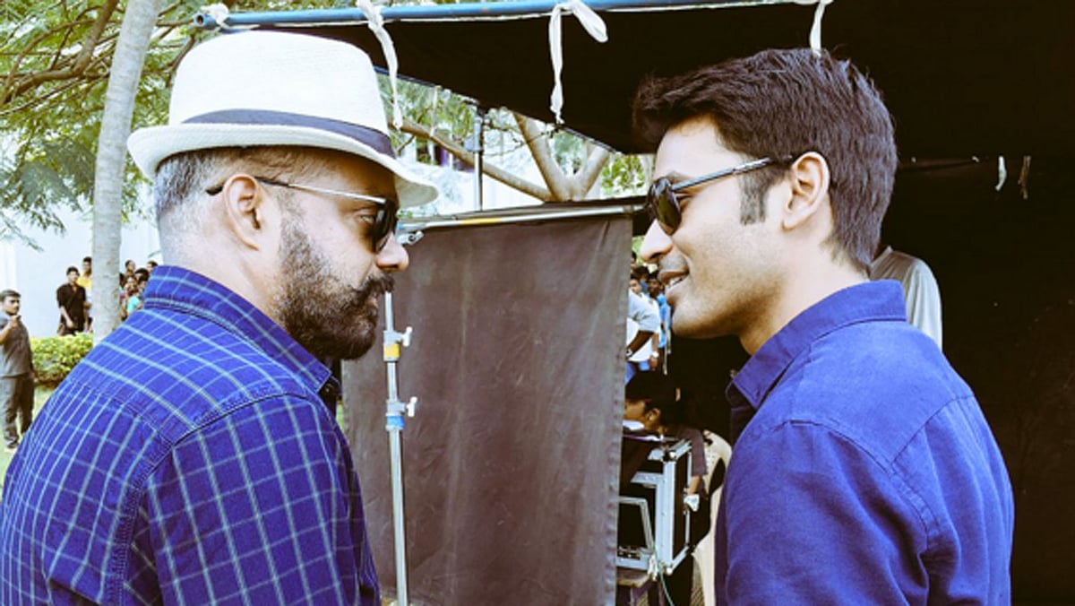 Gautham Menon and Dhanush on the sets of <i>Enai Noki Paayum Thota </i>(Photo courtesy: Twitter)