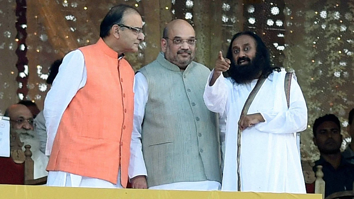 Finance Minister Arun jailtey and BJP President Amit Shah with Art of Living founder Sri Sri Ravishankar at the World Culture Festival on the banks of Yamuna. (Photo: Reuters)
