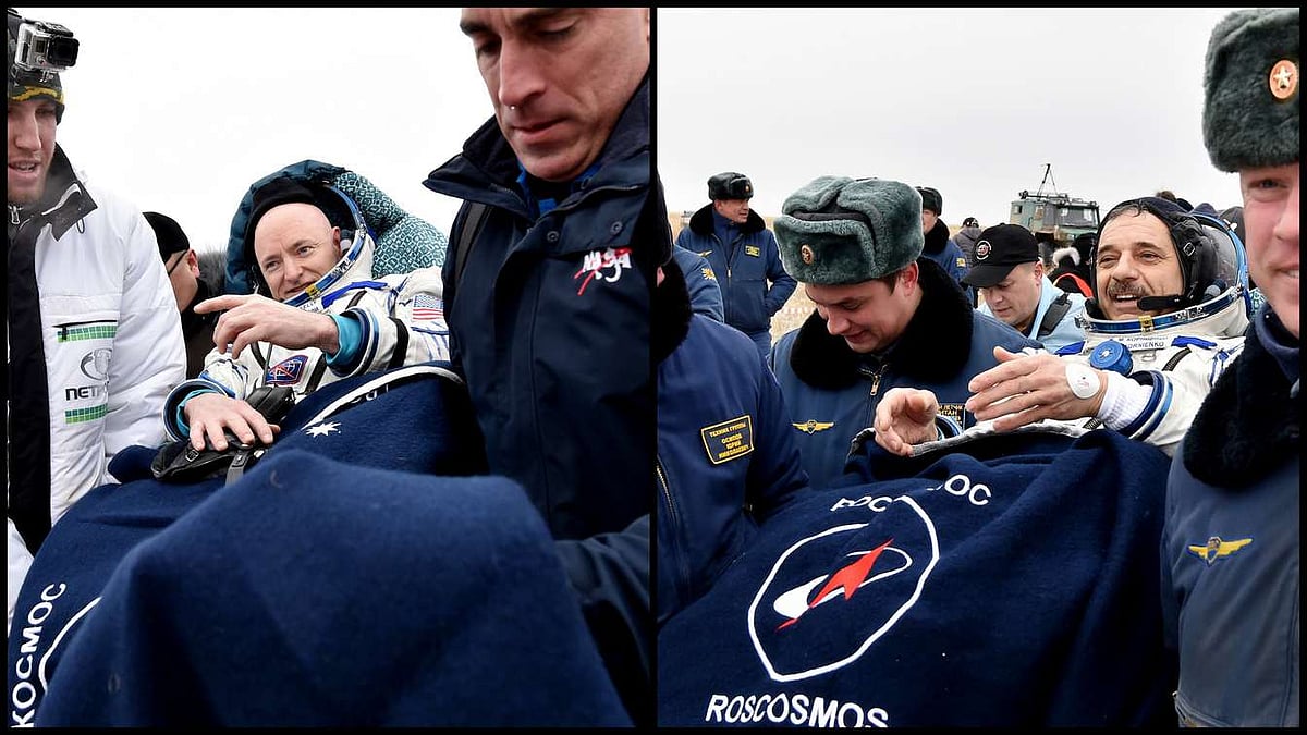 Ground personnel carry International Space Station (ISS) crew members Scott Kelly and Mikhail Kornienko after landing near the town of Dzhezkazgan, Kazakhstan, Wednesday, March 2, 2016. (Photo: AP)