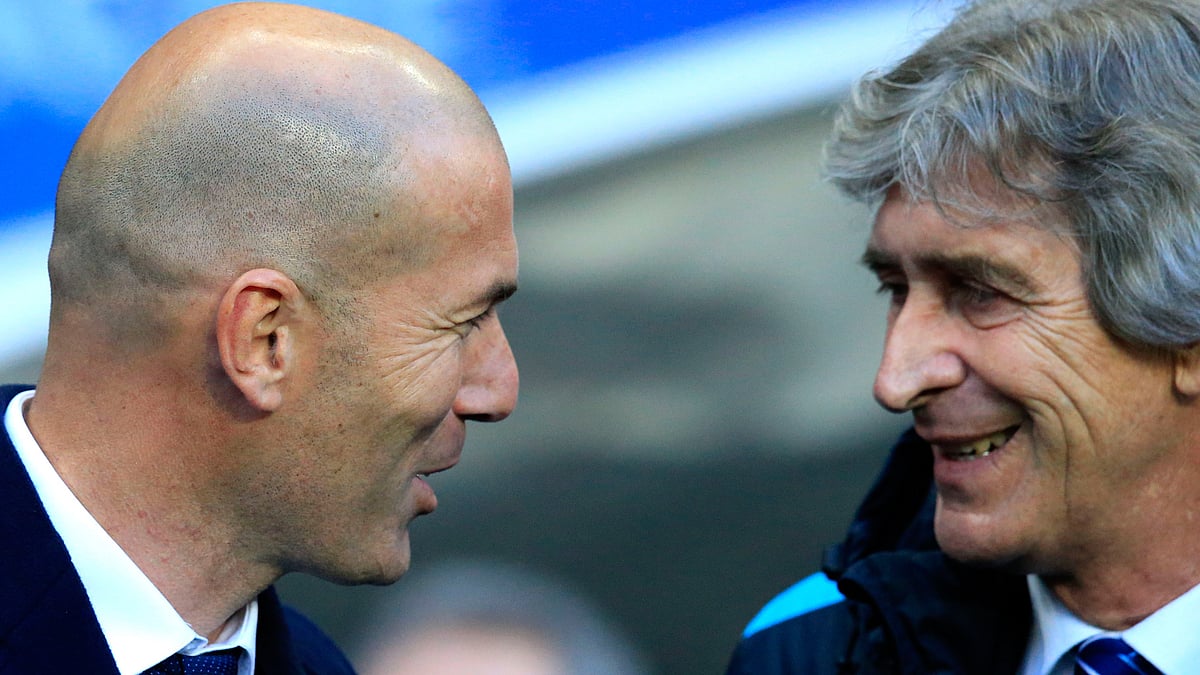 Zinedine Zidane talks to Manuel Pellegrini after the match (Photo: AP)