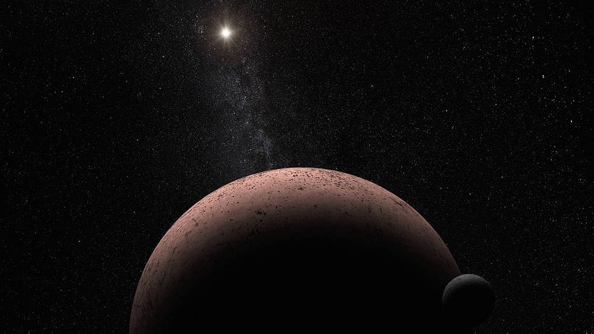 This artist’s concept shows the distant dwarf planet Makemake and its newly discovered moon. Makemake and its moon, nicknamed MK 2, are more than 50 times farther away than Earth is from the sun. (Photo Courtesy: <a href="https://www.nasa.gov/feature/goddard/2016/hubble-discovers-moon-orbiting-the-dwarf-planet-makemake/">NASA</a>/ESA/A Parker)<a href="https://www.nasa.gov/feature/goddard/2016/hubble-discovers-moon-orbiting-the-dwarf-planet-makemake"></a>