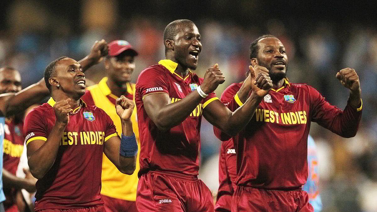 The West Indies cricket team celebrate after beating India at Wankhade Stadium, Mumbai (Photo: AP)&nbsp;