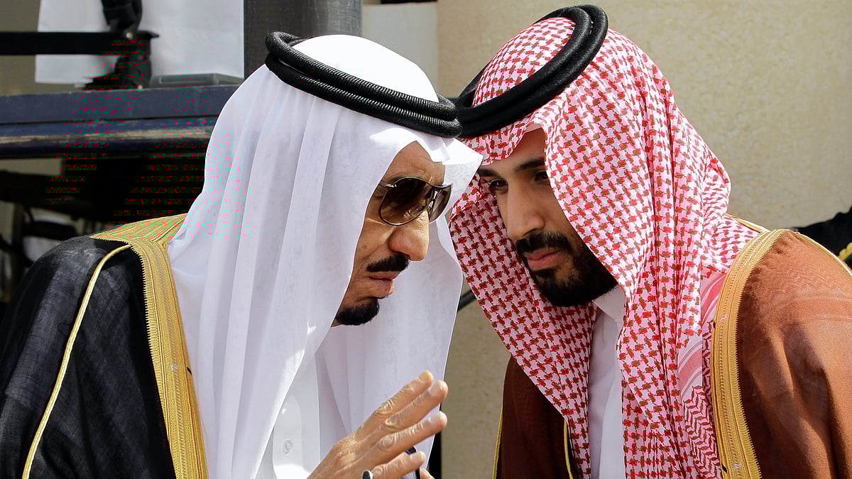 In this 14 May  2012 file photo, then Crown Prince Salman bin Abdul-Aziz Al Saud, left, speaks with his son Prince Mohammed bin Salman. (Photo: AP)