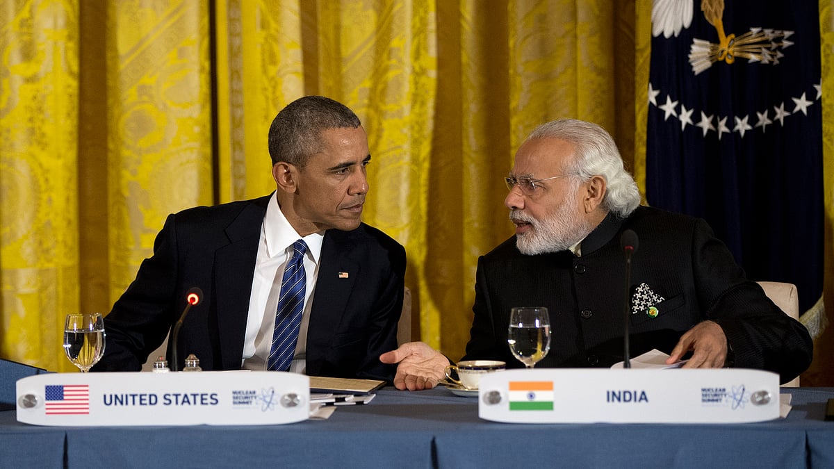 President Barack Obama talks with India’s Prime Minister Narendra Modi during a working dinner with heads of delegations of the Nuclear Security Summit in the East Room of the White House, in Washington on Thursday. (Photo: AP)