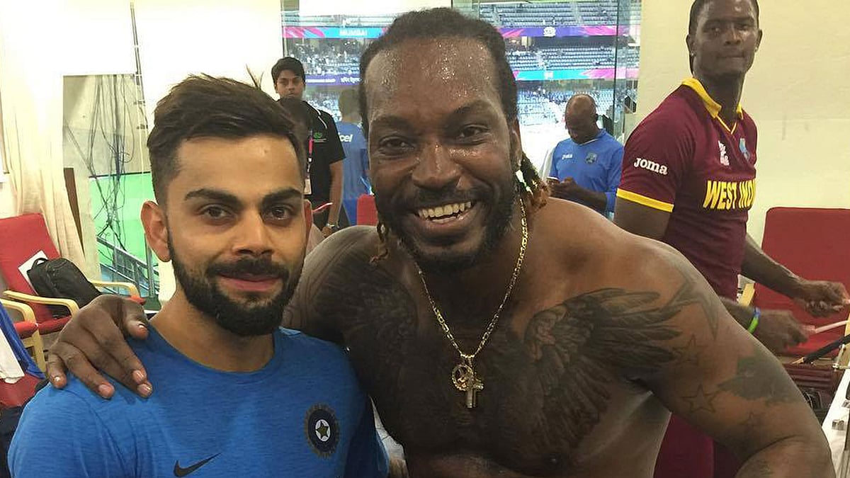 Virat Kohli (L) and Chris Gayle (R). (Photo: <a href="https://www.facebook.com/crictracker/?fref=photo">CricTracker Facebook</a>)