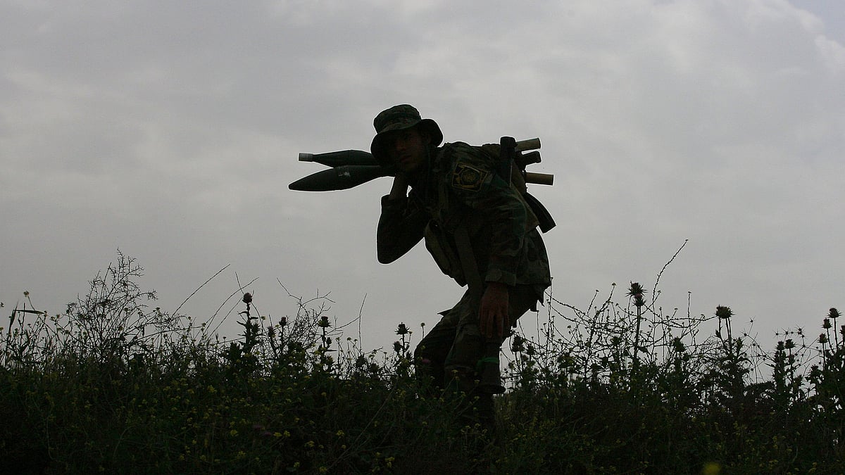 A volunteer with Popular Mobilization takes his combat position during a military operation launched by Iraqi Security forces and allied Popular Mobilization forces to regain control of the ISIS-held town of Besher in Iraq. (Photo: AP)