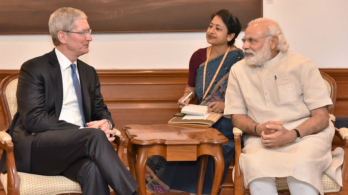 

Tim Cook speaking to Prime Minister Narendra Modi. (Photo: IANS)