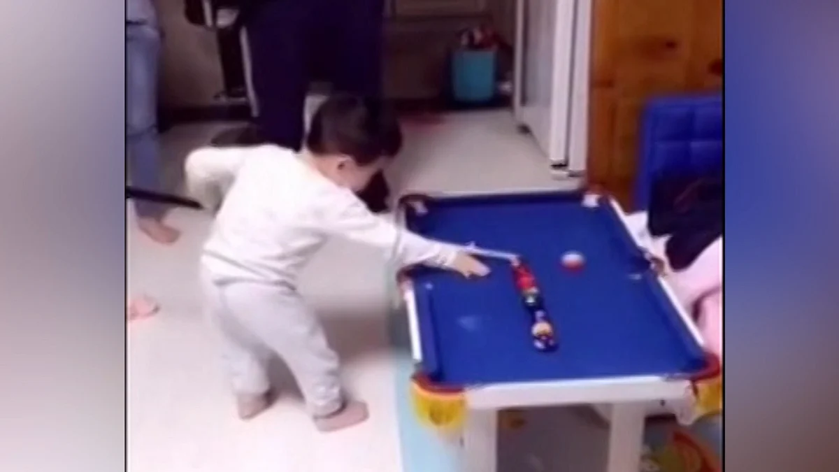 The young snooker masters knocking balls into the pockets one-by-one with astonishing accuracy. ( Photo: AP screengrab)