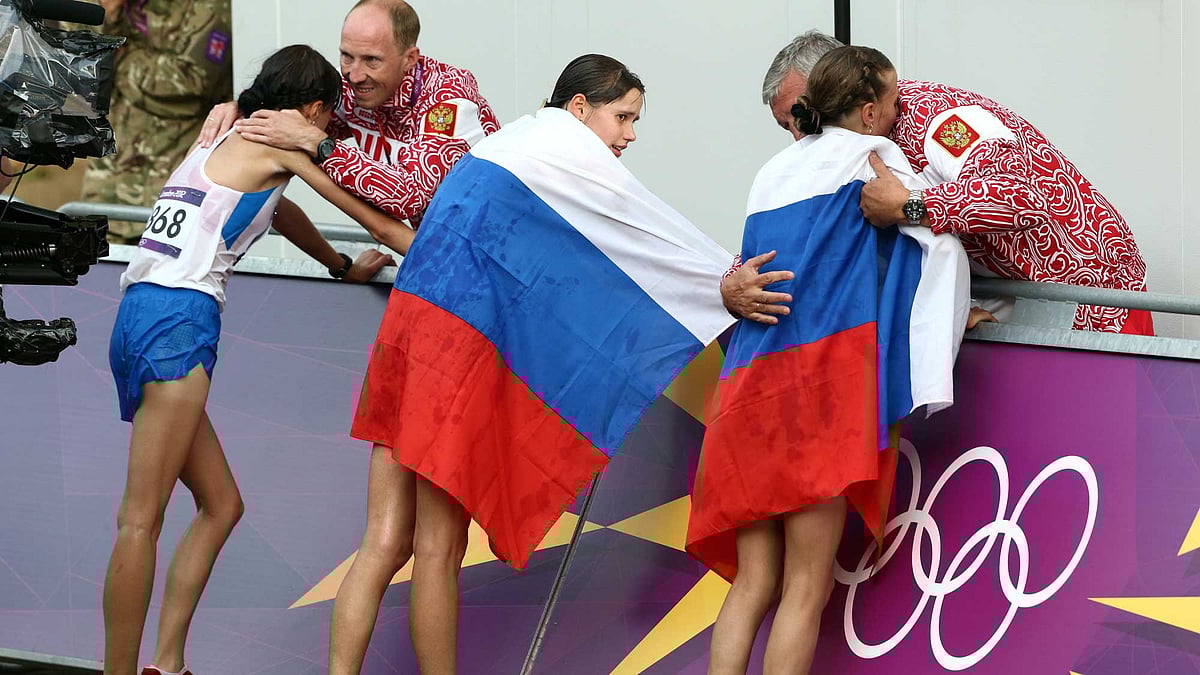 File photo of Russia coach Alexey Melnikov with track athletes at the  2012 Summer Olympics in London. (Photo: AP)