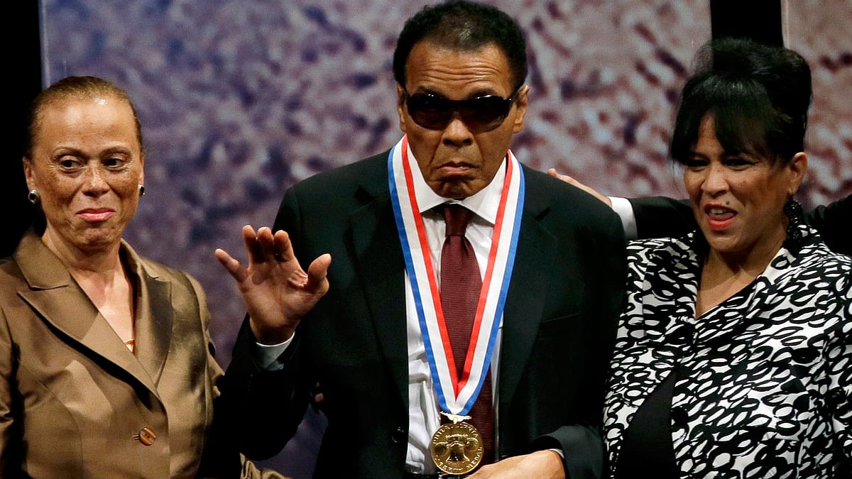 In this 13 Sept, 2012, file photo, retired boxing champion Muhammad Ali waves alongside his wife Lonnie Ali, left, and his sister-in-law Marilyn Williams, right, after receiving the Liberty Medal during a ceremony at the National Constitution Center in Philadelphia. (Photo: AP)