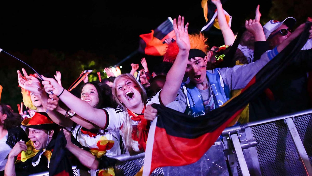 German soccer fans celebrate as their team scores the second goal during the Euro 2016. (Photo:AP)   